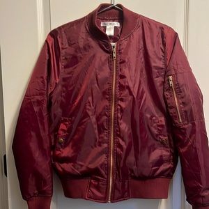 Wine colored bomber jacket with gold zippers/buttons